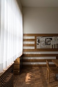 white laced curtain inside room